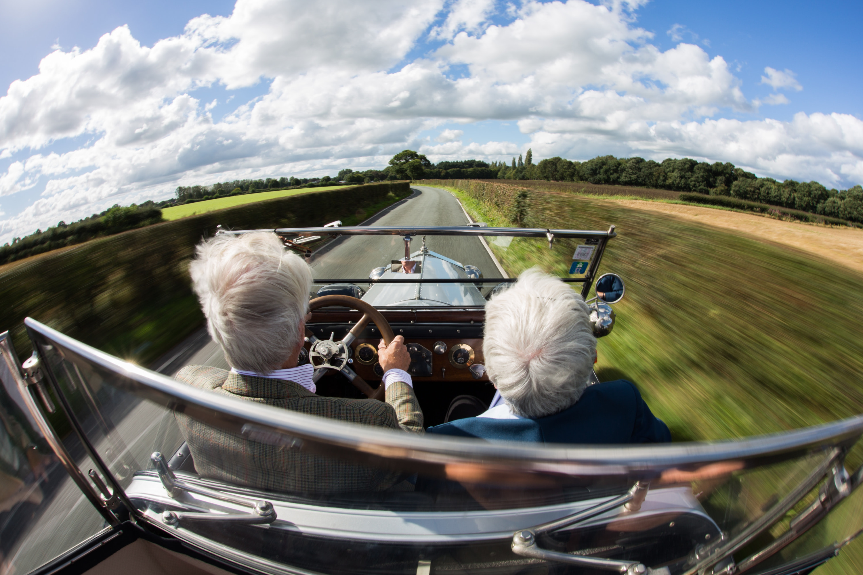 AARP Defensive Driving Class - Couple Driving Classic Car